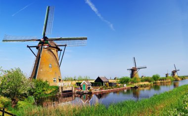 Vertical Panorama of canals and water mills clipart