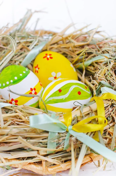 Closeup basket with colorful Easter Eggs — Stock Photo, Image