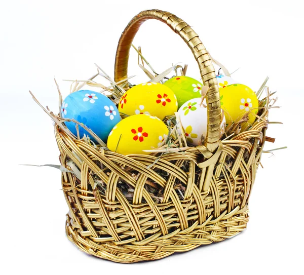 Closeup basket with colorful Easter Eggs — Stock Photo, Image