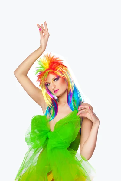 Beautiful girl with vibrant make-up wearing multicolored wig and creative d — Stock Photo, Image