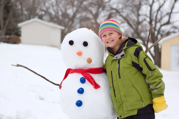 Cute Girl and Her Snowman — Stock Photo, Image