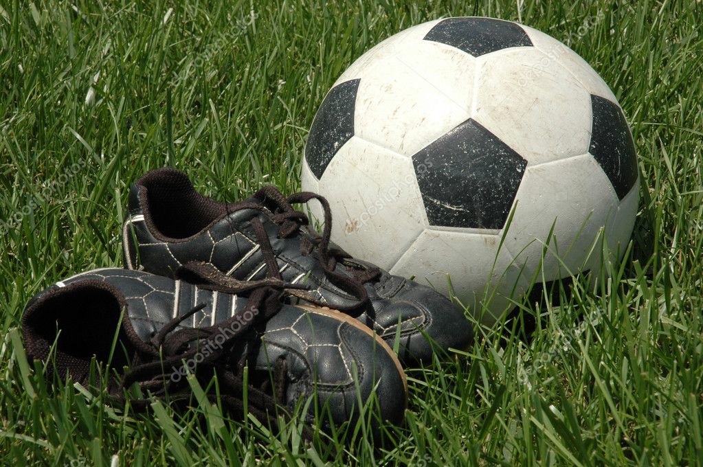 Soccer Shoes and Ball in Tall Grass — Stock Photo © PrairieRattler #5255759