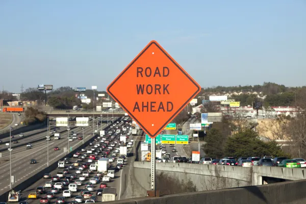 Road Work Ahead Sign with traffic — Stock Photo, Image