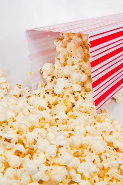 Popcorn falling out of a holder — Stock Photo, Image