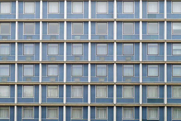 Symmetrical facade windows full of the same