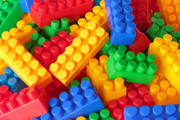 Leksak tegelstenar färgbakgrund — Stockfoto