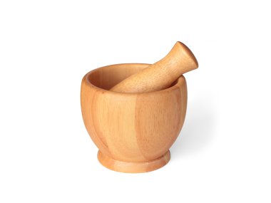 Wooden pestle and mortar on white background clipart