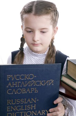 Girl and Russian-English dictionary clipart