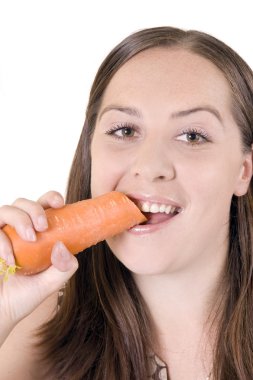 Girl gnaws carrot clipart