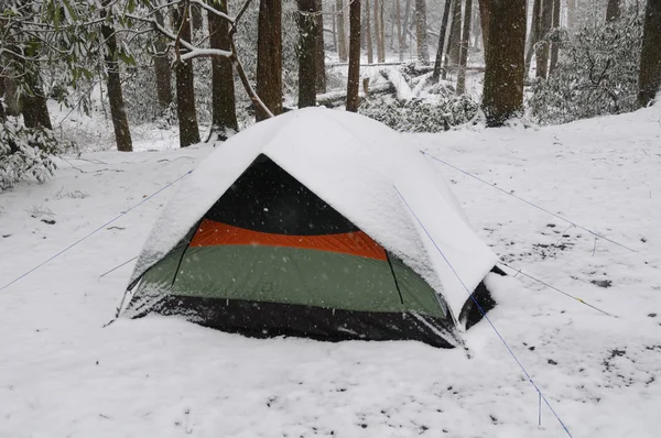 Tent in a spring snow — Stock Photo, Image