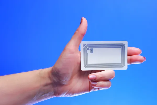 Hand with EPC RFID tag — Stock Photo, Image