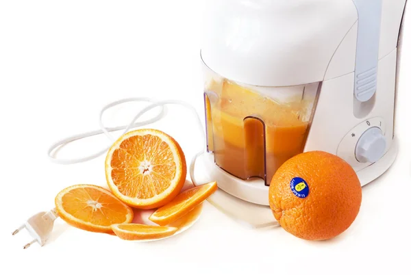 stock image Juice extractor and oranges