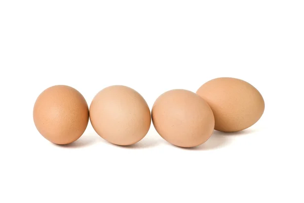 Quatro ovos castanhos — Fotografia de Stock