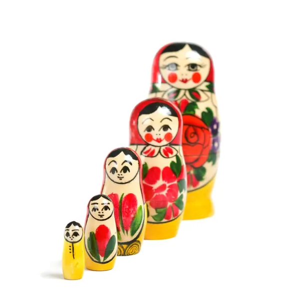 Matrioshka doll over Wit — Stockfoto