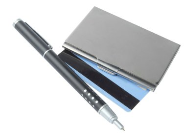 Business card holder and pen over white clipart