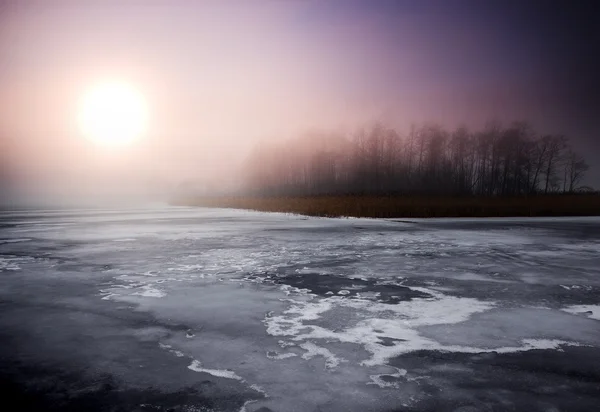 Frozen lake and sunset — Stock Photo, Image