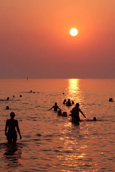 Stock image Bathing at sunset